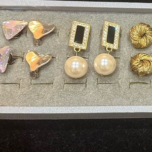 9 pairs of Vintage Clip on earrings.
